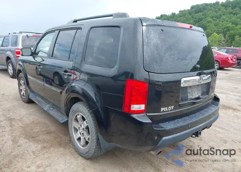 2010 Honda Pilot Touring z USA, uszkodzony, nr VIN 5FNYF4H98AB022133